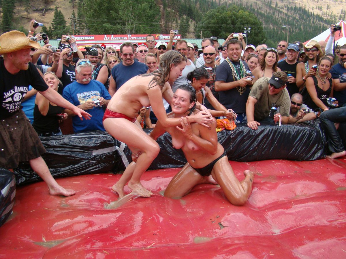 Oiled sexy girls outdoor wrestling